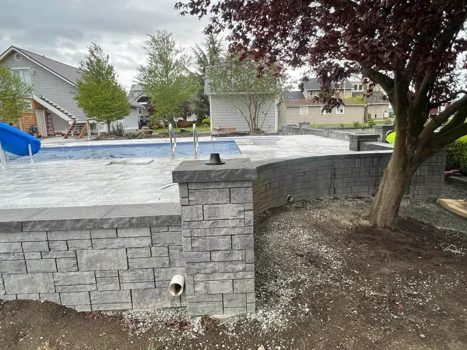 Pool surround retaining wall view
