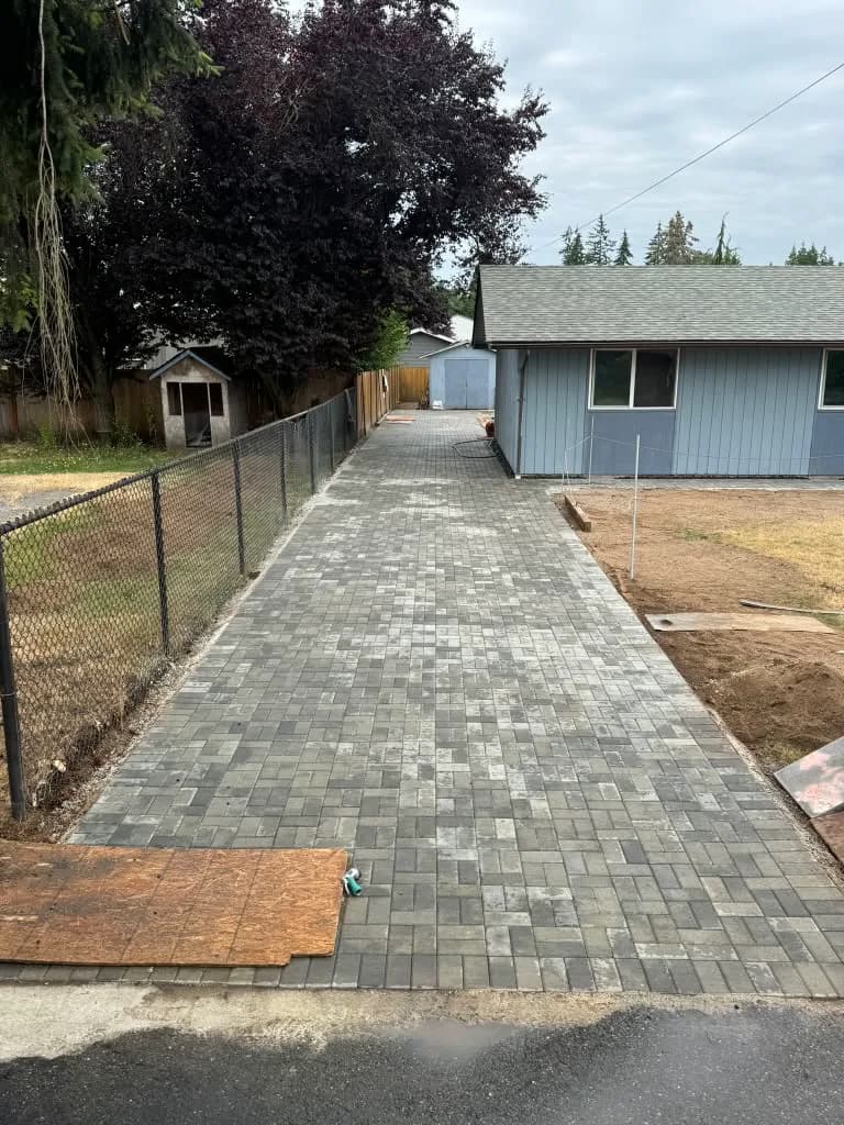 Long brick paver driveway and walkway