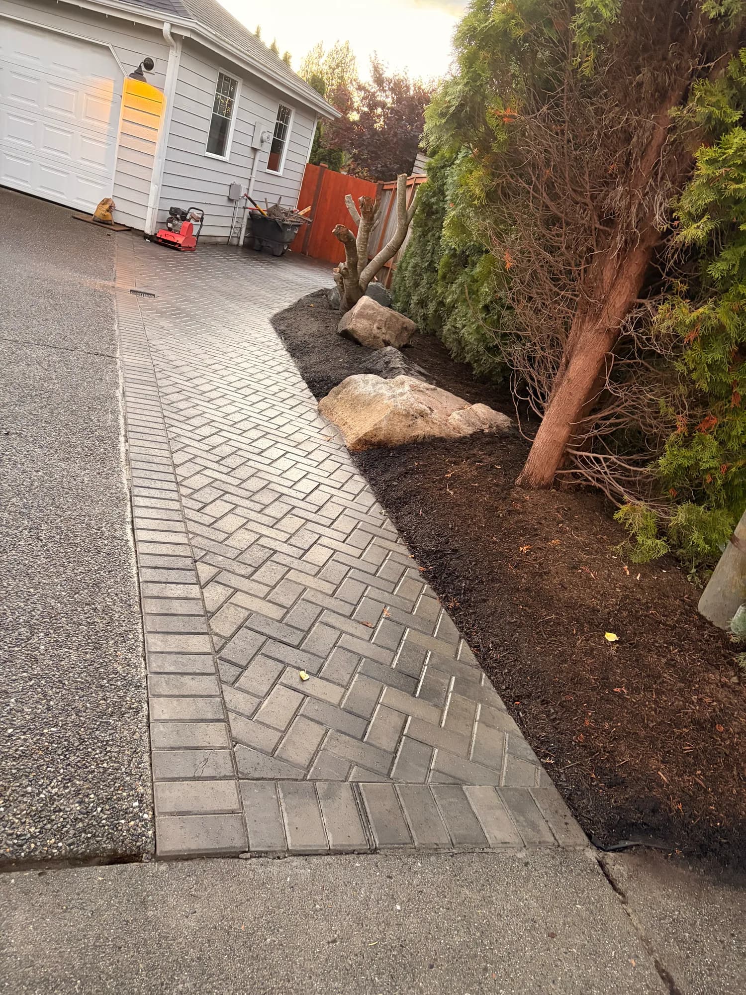Paver walkway along side of house